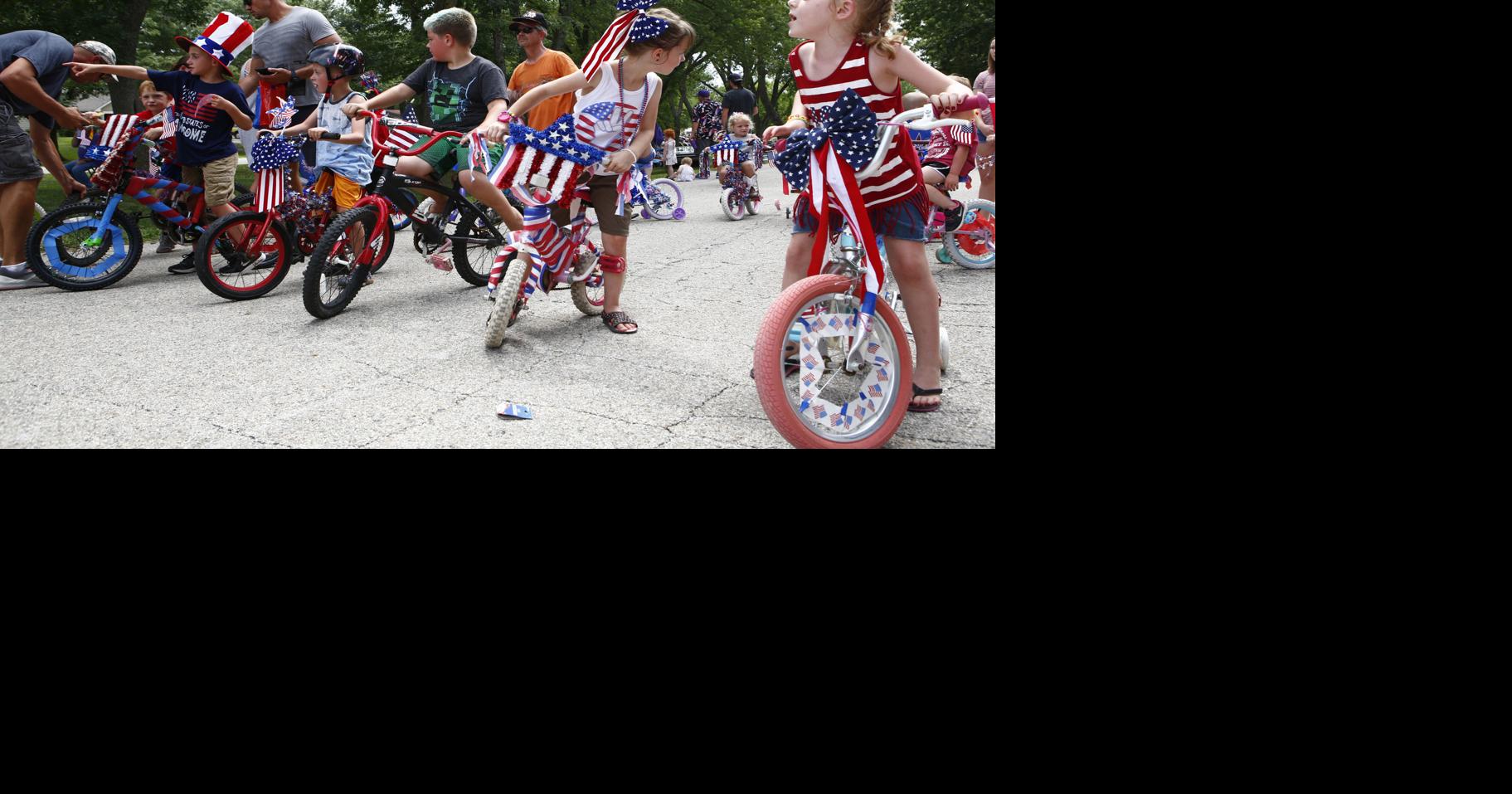 Children race bikes during Randolph Fourth of July parade Local News
