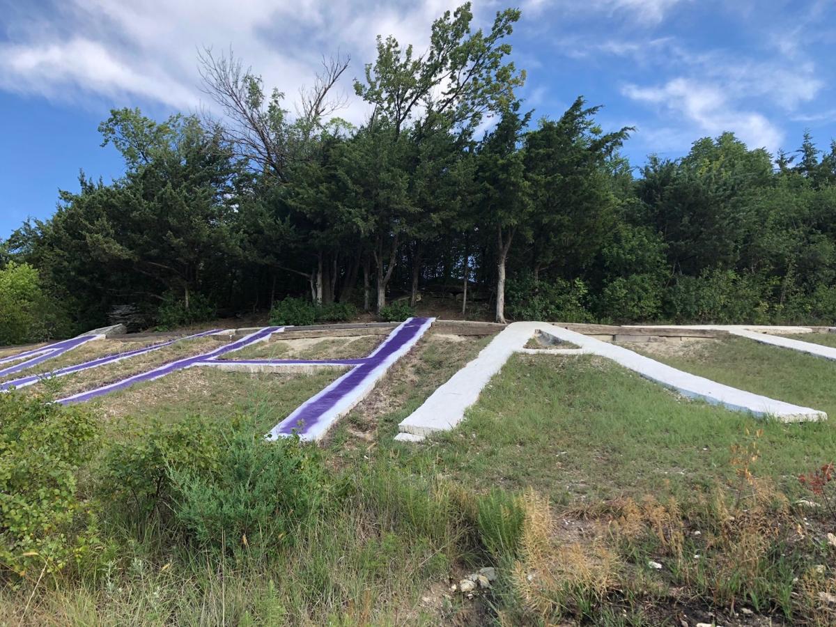 Why Is The Manhattan Sign On Bluemont Hill Painted Purple I