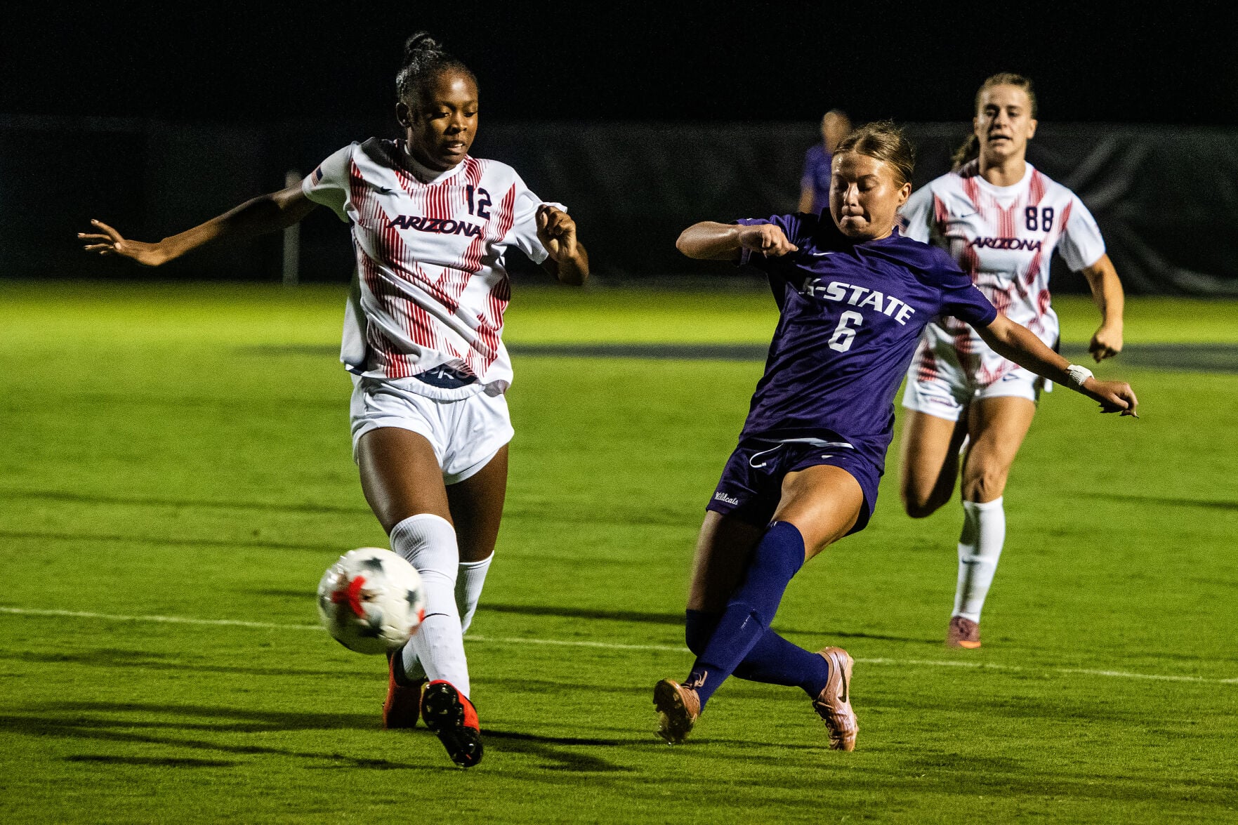K-State soccer forward Adelle Francis scoring a goal against BYU defense