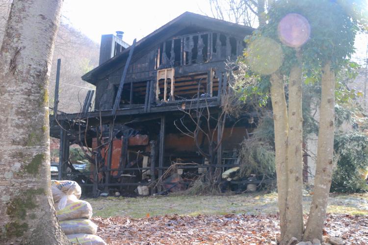 Mystery fire involving exploding propane tanks partly destroys Maggie