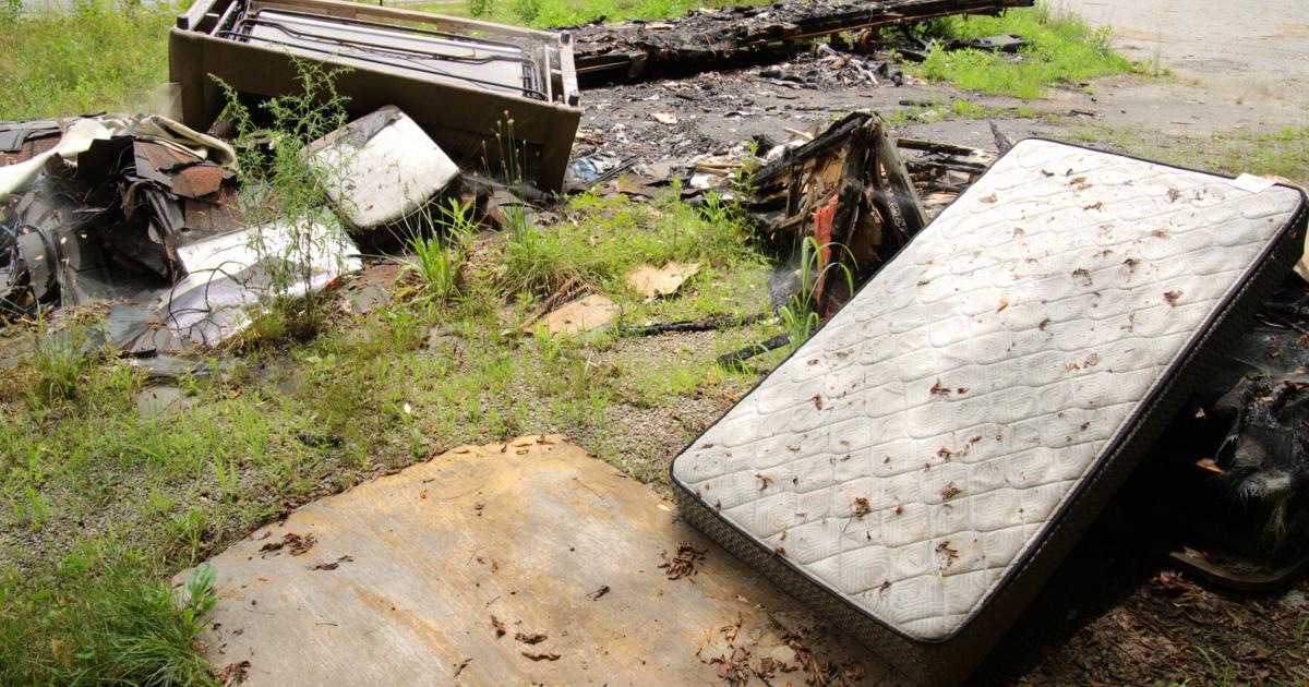 Who should clean up? Ownership issues leave debris pile on roadside
