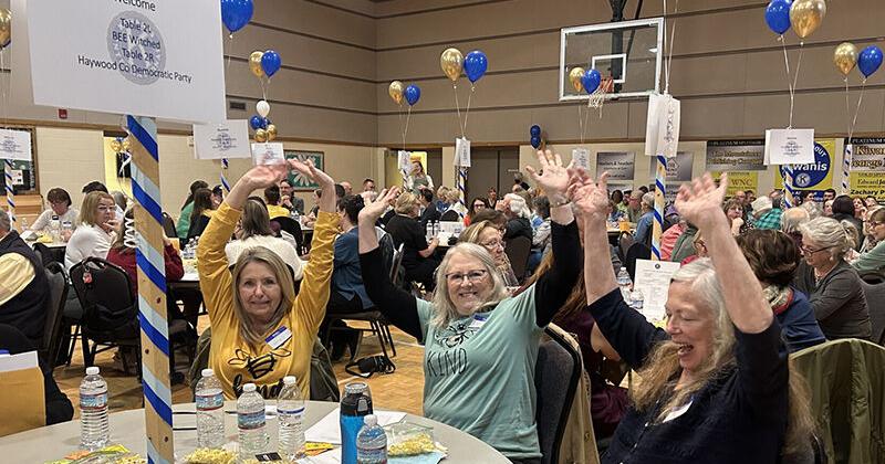 Kiwanis spelling bee hands in air - B. Johnson