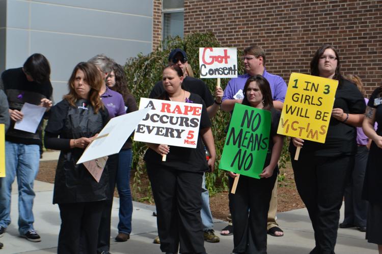 Rally kicks off domestic violence awareness month | News ...