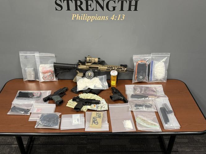 Man arrested after allegedly shooting into vehicle, drugs and guns ...