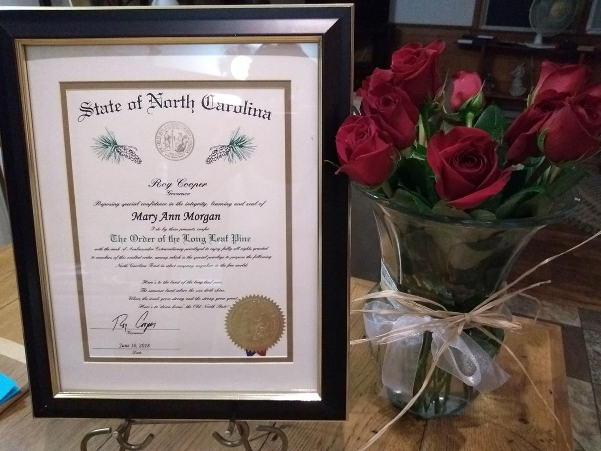 Mary Ann receives Order of Long Leaf Pine News