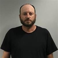Rock thrown at neighbors turns into felony charge