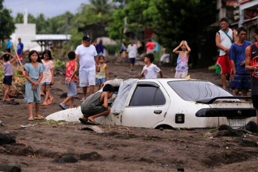 14 Dead, Thousands Evacuated As Tropical Storm Batters Philippines ...