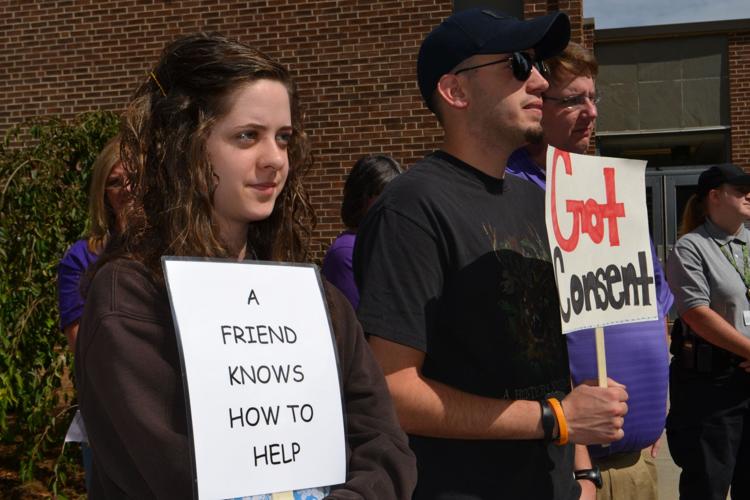 Rally kicks off domestic violence awareness month | News ...