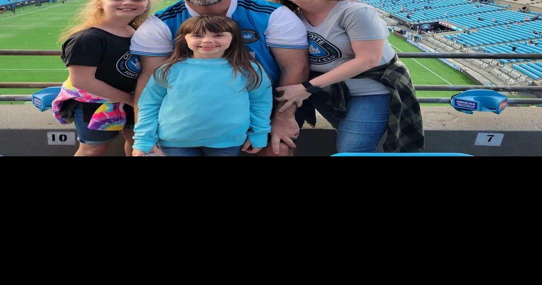 Coach Black, pictured with wife Tabitha Black and their 2 girls, Nori