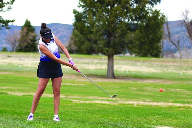 0429 Sabine Juarez golfing