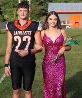 Lexi Williams being escorted by Dylan Gibson.