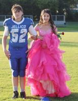 Emily Maggard being escorted by Reace Anderson.
