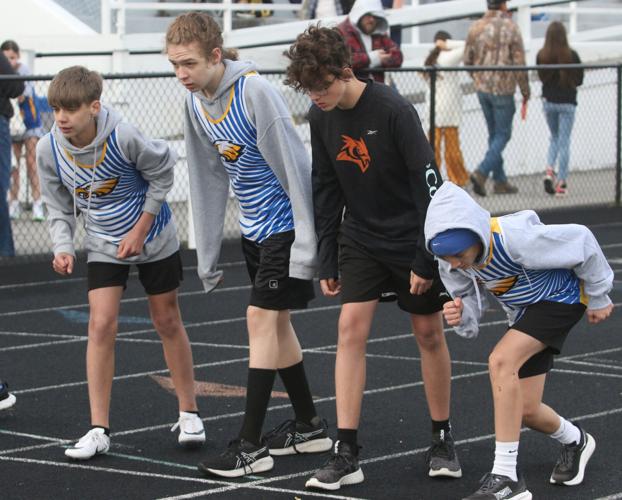 Athletes preparing to run.