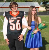 Mallory Neal being escorted by Kaden Herrin.