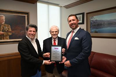 State Senator Ken Yager (center), R-Kingston, is presented with the Tennessee Men’s Health Network Man of the Year award from Board member George Bove (left) and Executive Director Mike Leventhal (right).