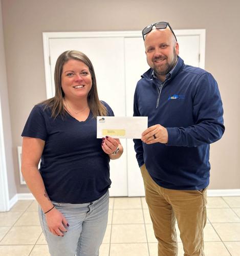 KLC presents liability grant to Vine Grove Local News