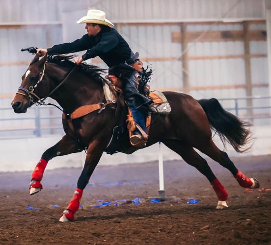 E’town resident is cowboy mounted shooting champion