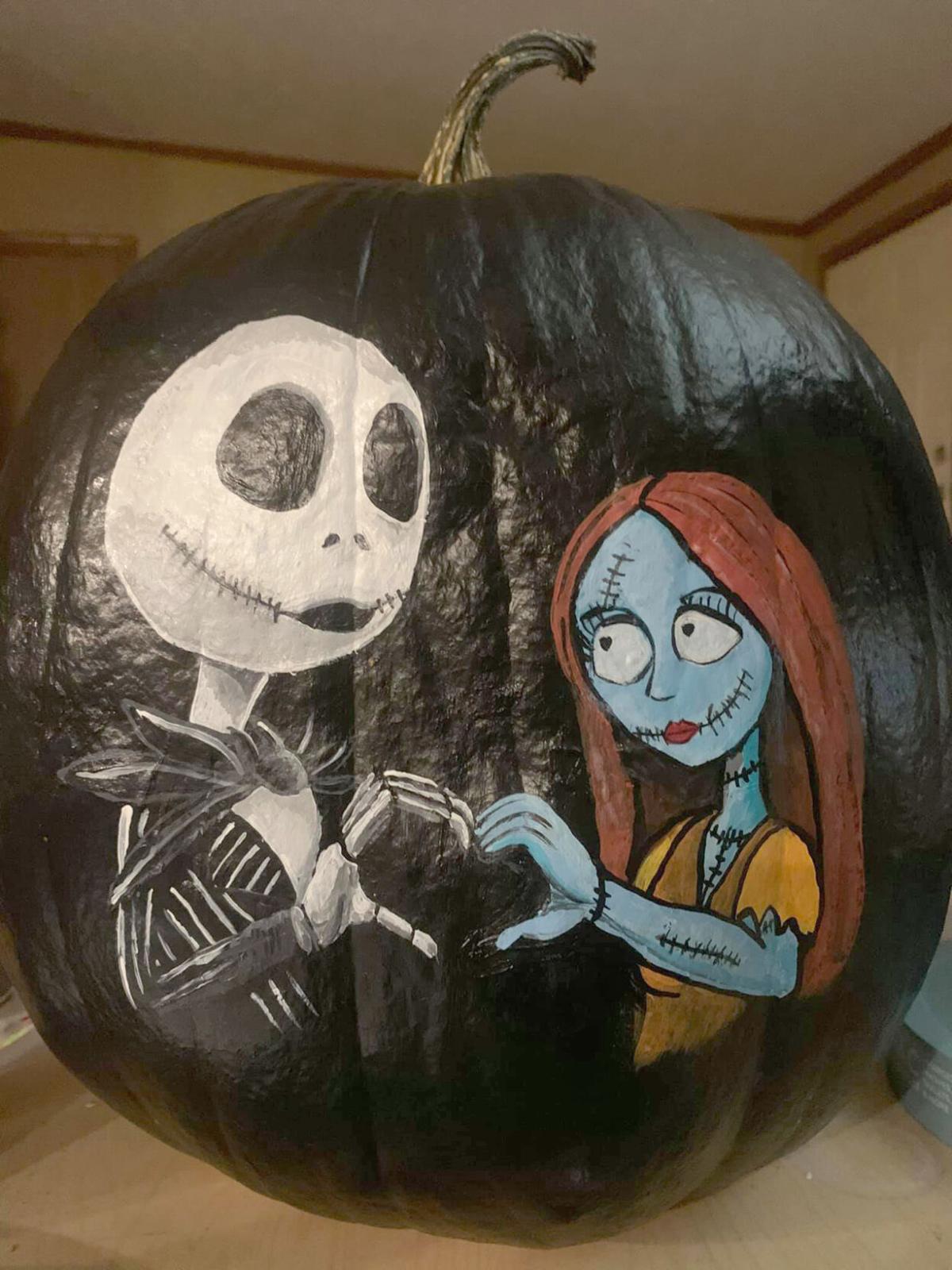 Painting pumpkins for Halloween art Pulse
