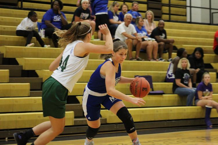 GIRLS’ BASKETBALL Lady Trojans adjusting to new roles Sports