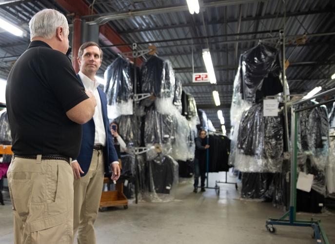 Beshear tours plant, expansion at Nationwide Uniform in Hodgenville