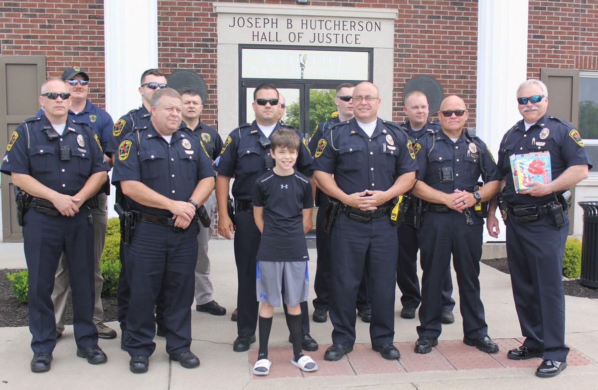 Radcliff police help youngsters beat the heat with Popsicles Local