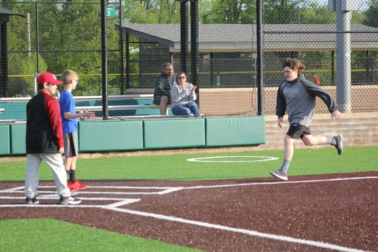 Getting their kicks Sports Park initiates kickball action Local News