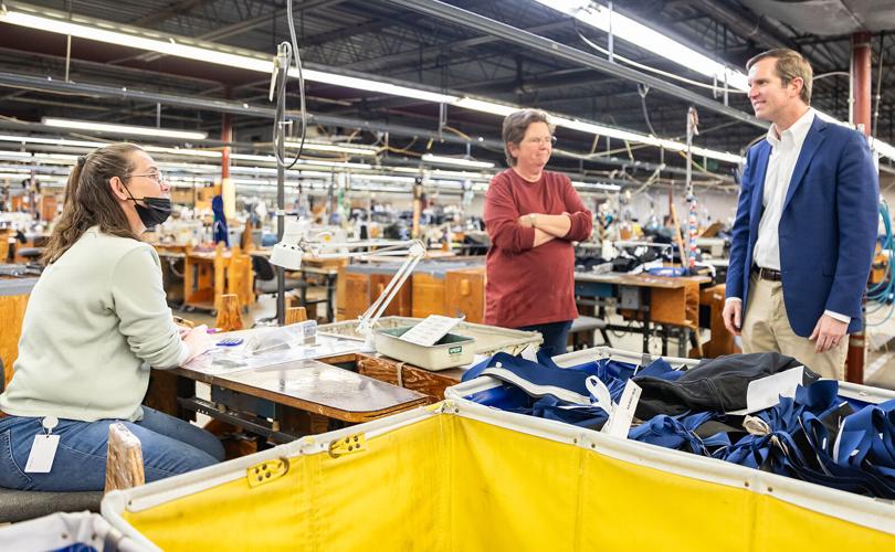 Beshear tours plant, expansion at Nationwide Uniform in Hodgenville