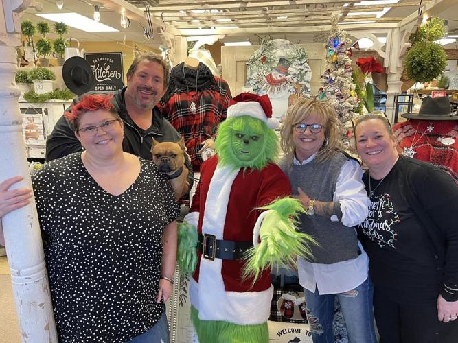 The Grinch visits businesses in Radcliff