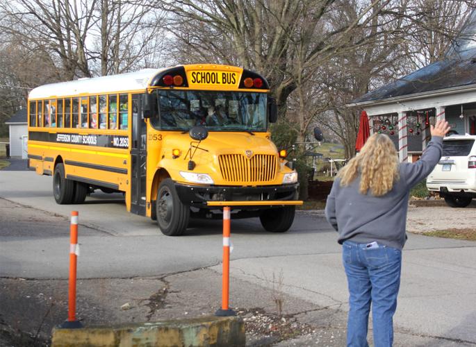 School buses offload supplies for tornado relief Local News