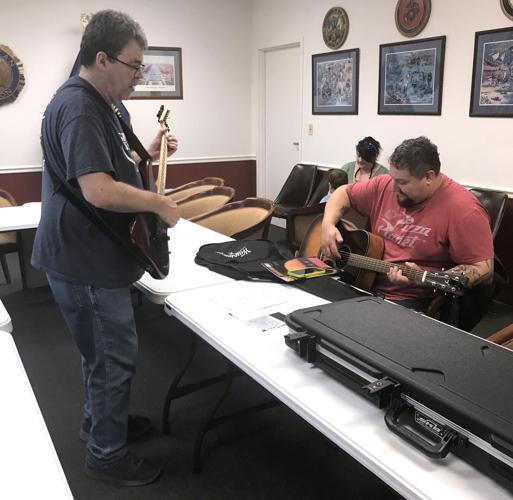 Program provides guitar lessons to vets Local News