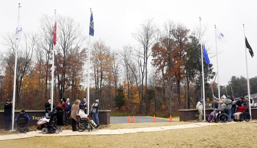 Veterans tribute flags raised at Radcliff center Local News