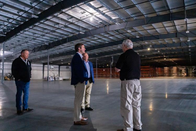 Beshear tours plant, expansion at Nationwide Uniform in Hodgenville