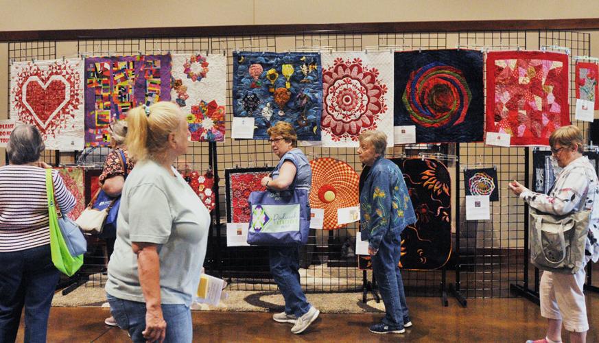 Quilt enthusiasts flock to Extension service for annual show, Local News