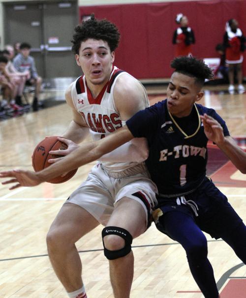 BOYS’ BASKETBALL: Bulldogs hold on to top E’town