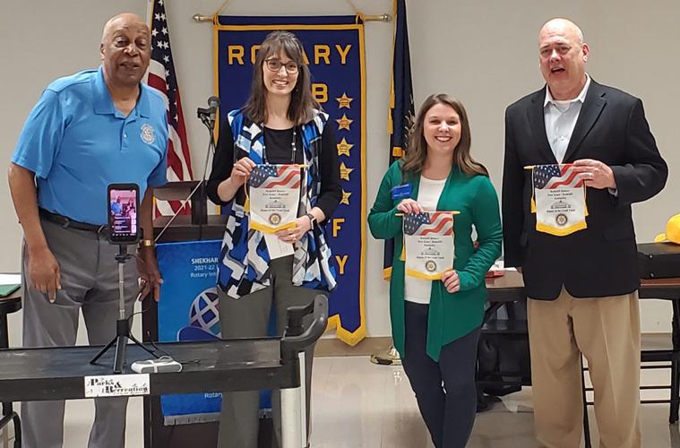 Radcliff Rotary Club members award speech contest winners Neighbors