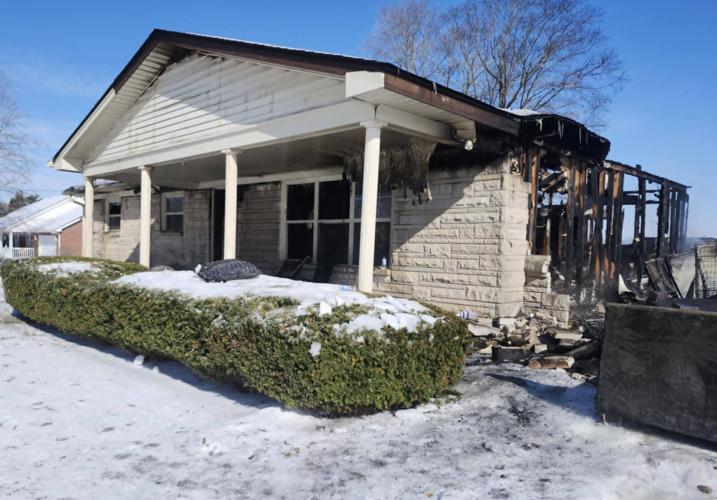 Dog saves family from house fire | Local News | thenewsenterprise.com