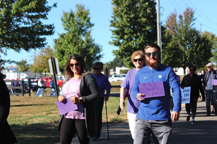 Dozens walk to support domestic violence victims | Local News ...