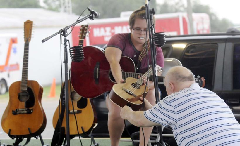 Local singers, songwriters showcased in fair spotlight Local News