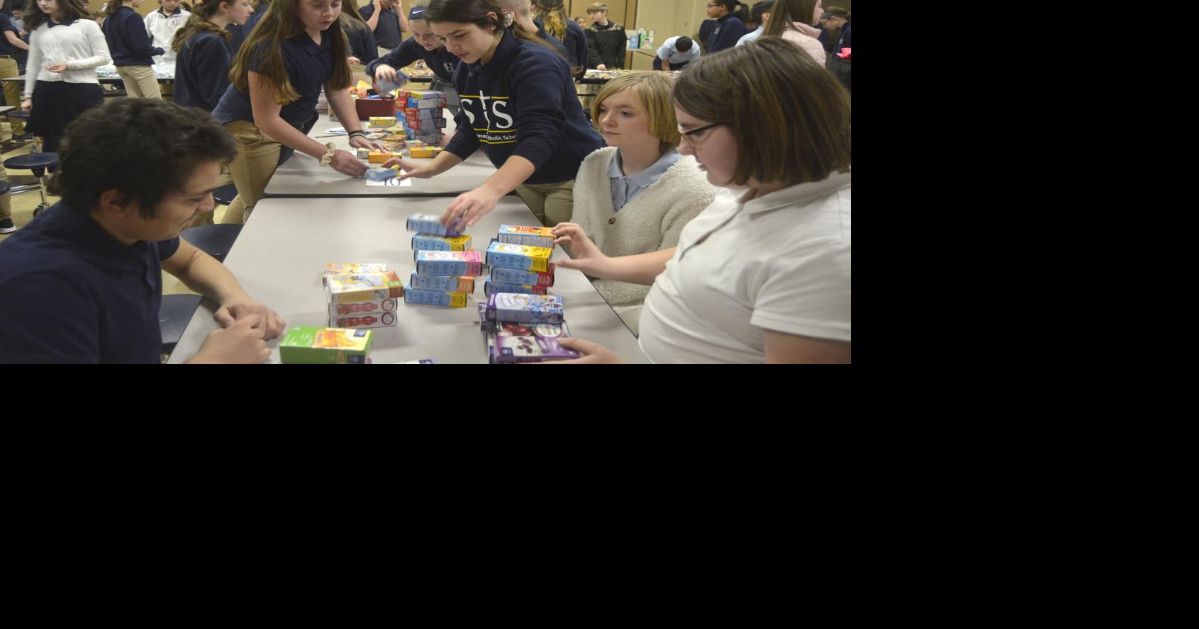 SJS students prepare packages for military | Education ...