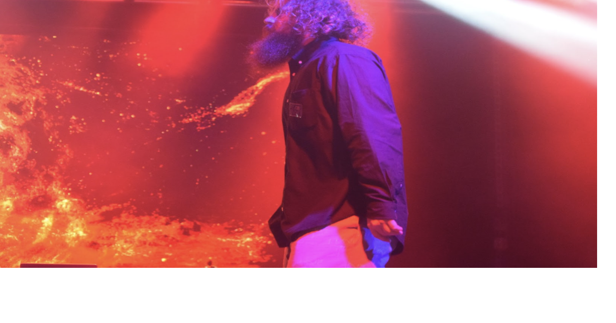 Kevin Saurer hyping up concert audience | Multimedia | theonlinecurrent.com