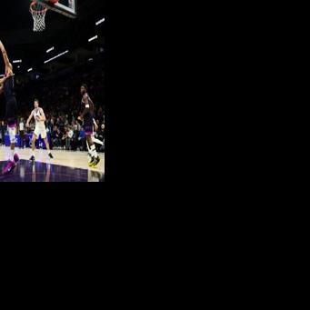 Golden State star Stephen Curry rises for a shot against Rudy Gobert in the Warriors' NBA victory over the Minnesota Timberwolves