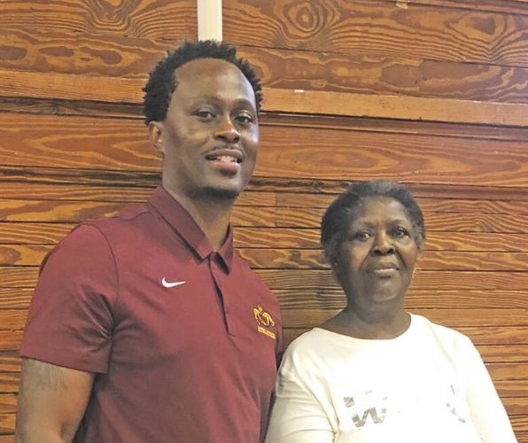 Brandon Isaac with his grandmother, Nerline Isaac.