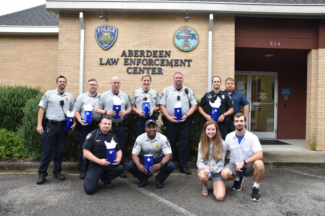 Couple Delivers Goody Bags to Aberdeen Police Department Features