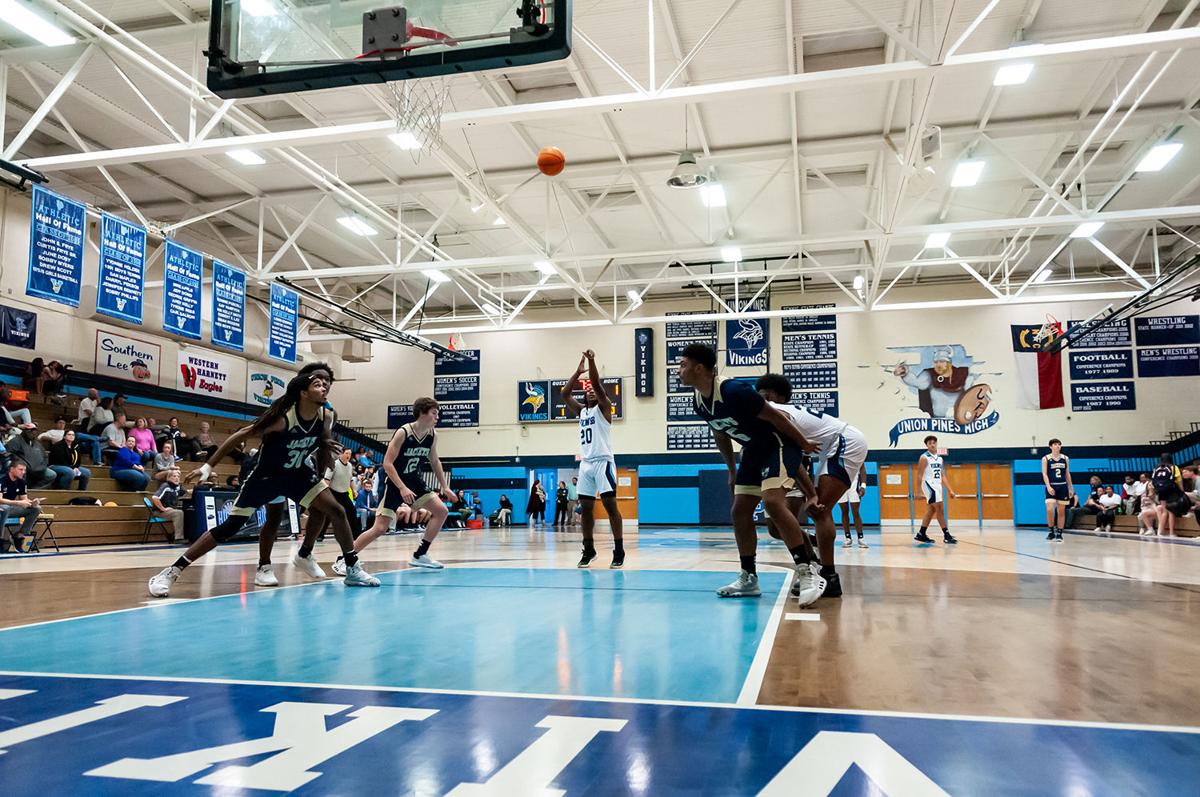 Union Pines men defeat Lee County 49-47