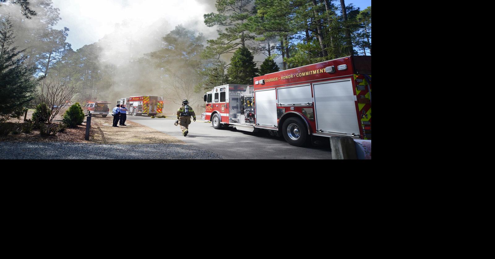 Photos Firefighters Battle Blaze in Pinehurst