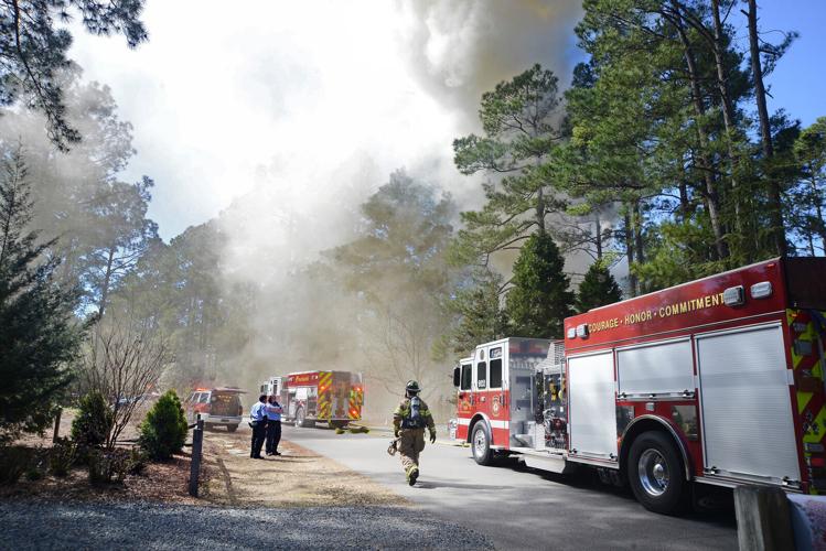 Photos Firefighters Battle Blaze in Pinehurst