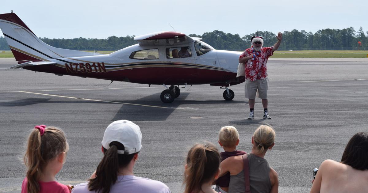 Santa Visits For Christmas In July