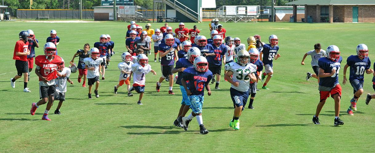 Kids, Teens Tackle Summer Football Camp at Pinecrest Multimedia
