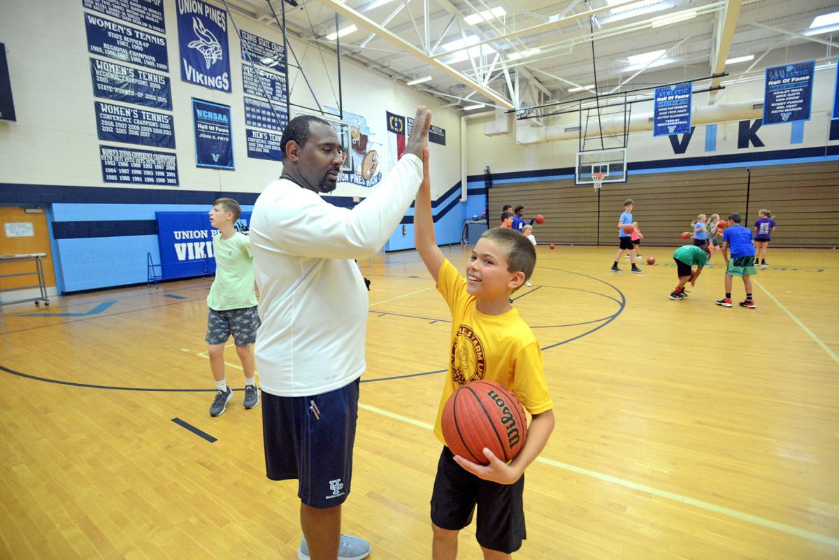 Kids Get Pointers From Union Pines Coach At Youth Basketball Camp