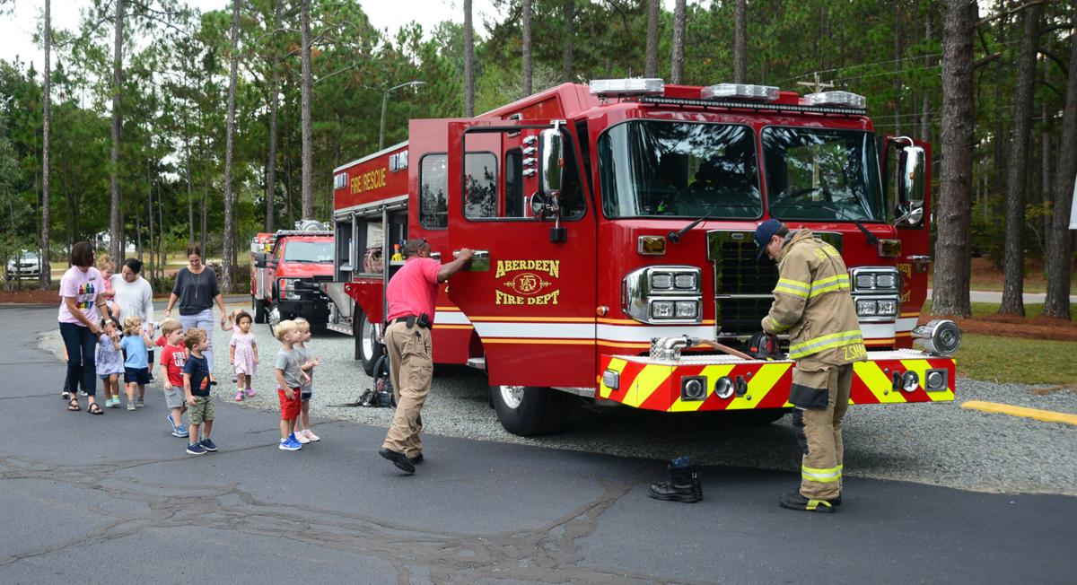 Sparky & firefighter frineds 10.jpg